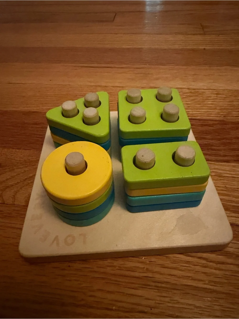 Lovevery Wooden Shape Stacking Puzzle - Blue, Yellow, Green and Teal